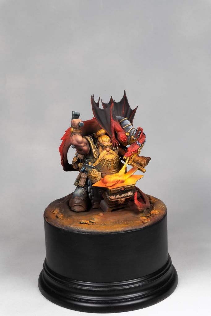 Detailed fantasy figurine with a warrior and dragon design for collectors.