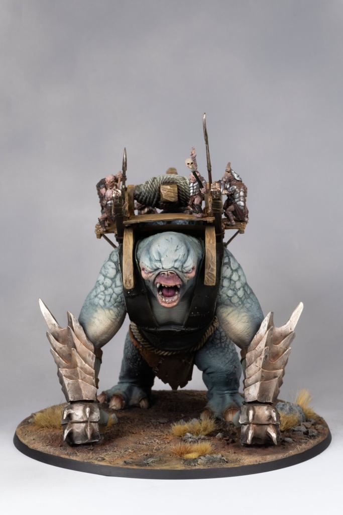 Miniature model of a Warhammer Catapult Troll with detailed armor and weapons.