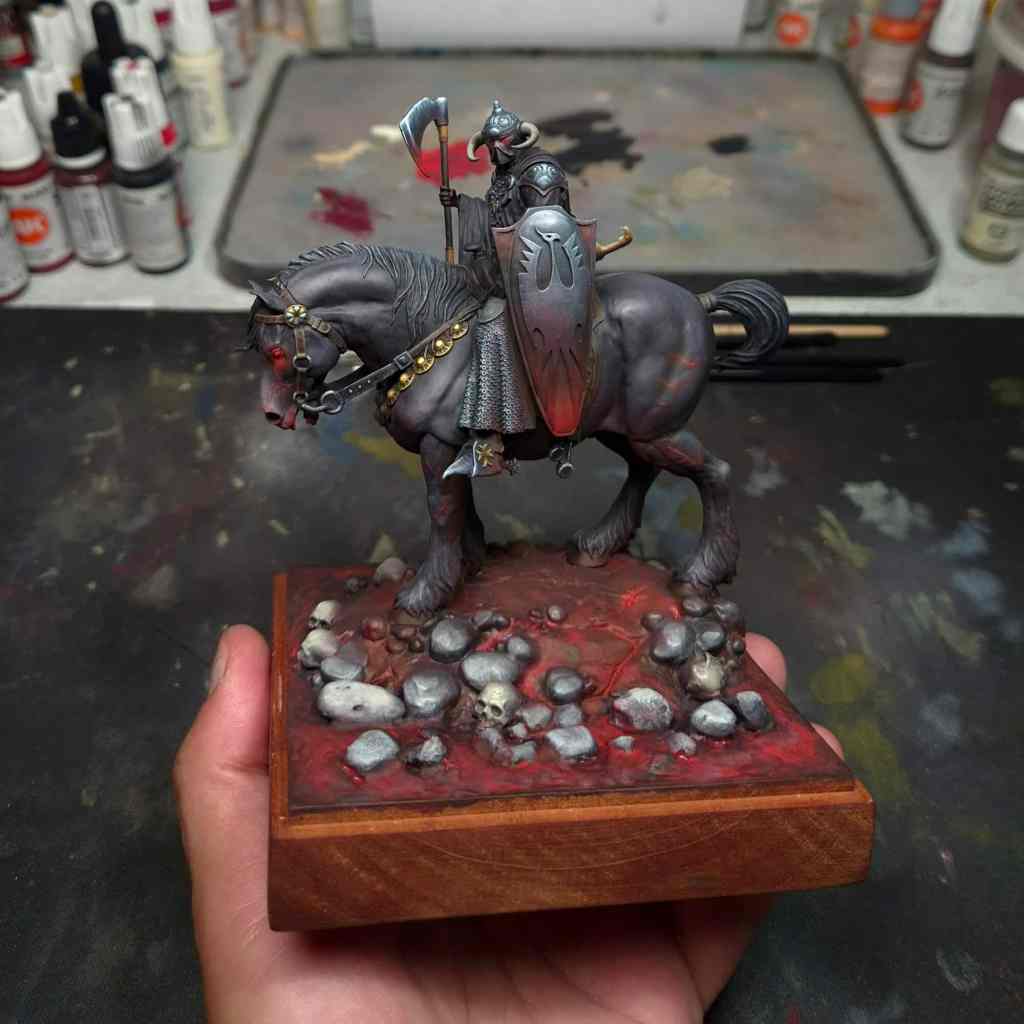 Hand-painted dark knight warrior on horseback miniature for tabletop gaming.