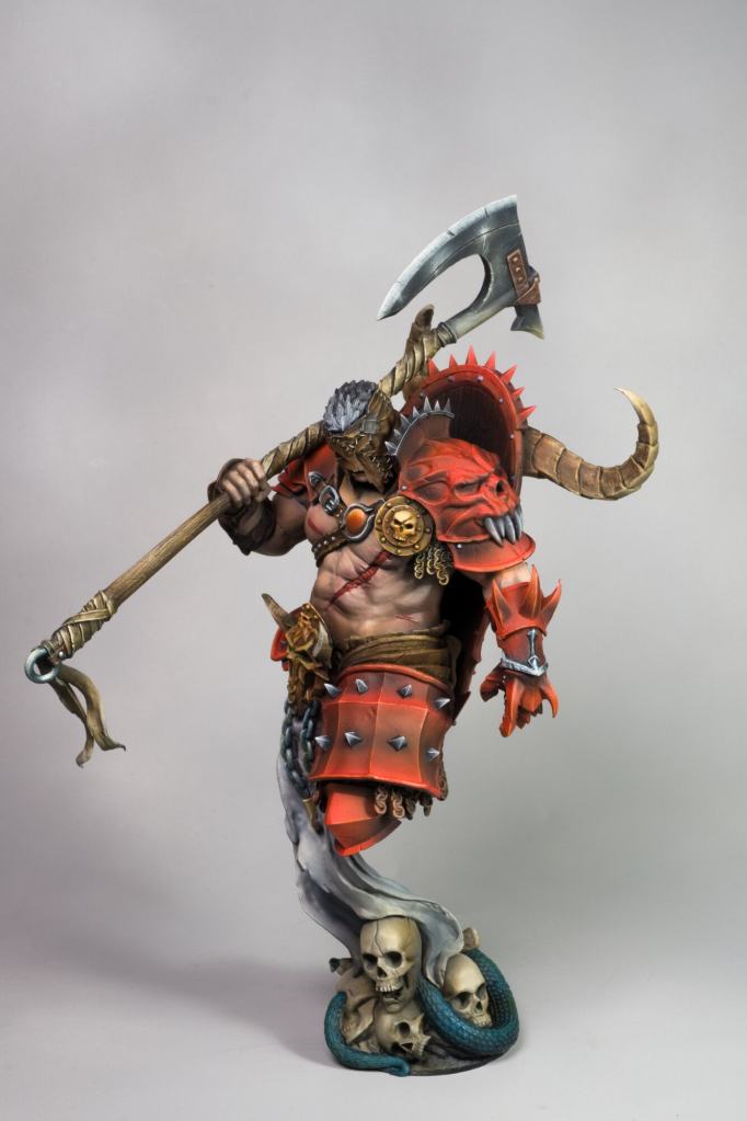 Detailed fantasy demon warrior sculpture with axe, armor, and skulls, on a neutral background.